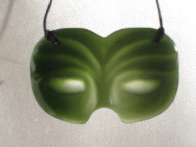 Masquerade Mask pendant showing translucency